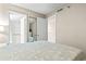Comfortable bedroom showcasing ample closet space and an ensuite bathroom at 4000 N Ocean Blvd. # 506, North Myrtle Beach, SC 29582