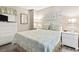 Cozy bedroom featuring a comfortable bed, soft lighting, and tasteful coastal-themed décor at 4000 N Ocean Blvd. # 506, North Myrtle Beach, SC 29582