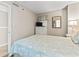 Cozy bedroom with bed, dresser, and window, bathed in natural light at 4000 N Ocean Blvd. # 506, North Myrtle Beach, SC 29582