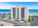 Oceanfront condo building with beach views, covered parking, and well-maintained landscaping at 4000 N Ocean Blvd. # 506, North Myrtle Beach, SC 29582