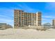 Stunning exterior view of this multi-story condo building, offering beach access and gorgeous ocean views at 4000 N Ocean Blvd. # 506, North Myrtle Beach, SC 29582
