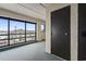 Hallway with large window looking out at a nearby property at 4000 N Ocean Blvd. # 506, North Myrtle Beach, SC 29582