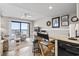 Open living area with balcony access, seating, and entertainment setup at 4000 N Ocean Blvd. # 506, North Myrtle Beach, SC 29582
