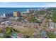 An aerial view of a charming home situated near the beach, with local shops and a parking lot nearby at 401 17Th Ave. S, North Myrtle Beach, SC 29582