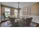 Formal dining room showcasing elegant decor, stylish furniture, and natural light, perfect for gatherings at 4023 Braid Ct., Myrtle Beach, SC 29588