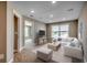 Cozy living room with plush seating, soft lighting, and a welcoming atmosphere, perfect for relaxation at 4023 Braid Ct., Myrtle Beach, SC 29588