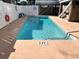 Inviting community pool with shallow end and clear depth markings at 4303 South Ocean Blvd. # 303, North Myrtle Beach, SC 29582
