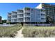Beautiful condos with private balconies and a walkway to the beach at 4303 South Ocean Blvd. # 303, North Myrtle Beach, SC 29582
