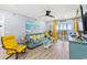 Bright and airy living room featuring comfortable seating and a view to the ocean at 4303 South Ocean Blvd. # 303, North Myrtle Beach, SC 29582
