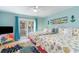Guest bedroom featuring two beds, access to a balcony and vibrant décor at 4307 Beverly Ct., North Myrtle Beach, SC 29582