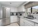 Bright kitchen featuring stainless steel appliances, subway tile backsplash, and granite countertops at 4307 Beverly Ct., North Myrtle Beach, SC 29582