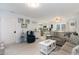 Open-concept living room showcases the kitchen and dining area, creating a cohesive living space at 4307 Beverly Ct., North Myrtle Beach, SC 29582