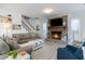 Comfortable living room with a fireplace, TV, and coastal-themed decorations at 4307 Beverly Ct., North Myrtle Beach, SC 29582
