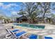 Inviting community pool area with ample seating and mature landscaping at 4307 Beverly Ct., North Myrtle Beach, SC 29582