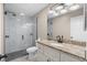 Bathroom featuring a marble shower, granite countertops, and modern fixtures at 4639 Mandi Ave., Little River, SC 29566