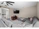 Cozy living room with a large comfortable sectional, tv, and neutral decor with barn door at 4639 Mandi Ave., Little River, SC 29566