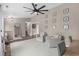 Open sitting area with neutral paint, a ceiling fan, hardwood flooring and ample lighting at 4639 Mandi Ave., Little River, SC 29566