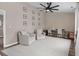 Inviting sitting area with neutral walls, a ceiling fan, and hardwood flooring. Perfect for relaxing or entertaining at 4639 Mandi Ave., Little River, SC 29566