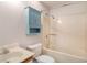 Bathroom with a bathtub, blue cabinet, and standard toilet at 510 Fairwood Lakes Dr. # 18N, Myrtle Beach, SC 29577