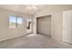 Bright bedroom features vaulted ceiling, door to balcony, and closet at 510 Fairwood Lakes Dr. # 18N, Myrtle Beach, SC 29577