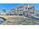 Inviting condo complex boasting multiple balconies overlooking lush grounds and waterway access at 510 Fairwood Lakes Dr. # 18N, Myrtle Beach, SC 29577