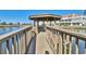 Picturesque gazebo on a pier offers serene views and seating, enhancing the waterfront living experience at 510 Fairwood Lakes Dr. # 18N, Myrtle Beach, SC 29577