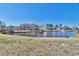 Scenic view of pond near condos, featuring fountain and gazebo, enhancing waterfront living at 510 Fairwood Lakes Dr. # 18N, Myrtle Beach, SC 29577