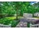 Expansive backyard with mature trees, sheds, and landscaping at 5113 Pee Dee Ln., Murrells Inlet, SC 29576