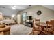 Bright bedroom featuring a bed, couch, sitting area, and television at 5113 Pee Dee Ln., Murrells Inlet, SC 29576