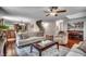 Living room flows into open kitchen and dining area, featuring hardwood floors and cozy seating at 5113 Pee Dee Ln., Murrells Inlet, SC 29576