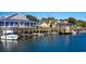 Waterfront restaurant with colorful umbrellas, boats, and scenic views at 5113 Pee Dee Ln., Murrells Inlet, SC 29576