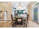 Charming dining area adjacent to the kitchen features a decorative stone tile floor at 5460 Huntington Marsh Rd., Murrells Inlet, SC 29576