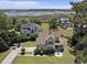 Desirable neighborhood home with a manicured lawn, mature trees, and tranquil views of the marsh at 5460 Huntington Marsh Rd., Murrells Inlet, SC 29576