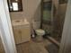 Full bathroom with a tiled shower, standard toilet, and a bright vanity with sink at 5578 Dongola Hwy., Conway, SC 29527