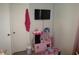 Bright bedroom featuring a play kitchen set and wall-mounted television at 5578 Dongola Hwy., Conway, SC 29527