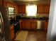 Well-lit kitchen with stainless steel appliances and dark countertops at 5578 Dongola Hwy., Conway, SC 29527
