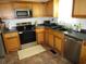 Modern kitchen featuring stainless steel appliances and wood cabinets at 5578 Dongola Hwy., Conway, SC 29527