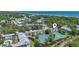 Overhead view displaying the condo complex with tennis courts and surrounding ponds with ocean view at 5905 South Kings Hwy. # 5202, Myrtle Beach, SC 29575