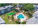 Aerial view of a community pool area featuring a pool, putt-putt golf, lounge chairs and picnic tables at 5905 South Kings Hwy. # 5202, Myrtle Beach, SC 29575