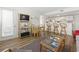 Bright living room with a dining area, wood floors, and an open floor plan at 5905 South Kings Hwy. # 5202, Myrtle Beach, SC 29575