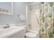 Cozy bathroom features a vanity, toilet, and shower/tub combo with a lively, colorful shower curtain at 5905 South Kings Hwy. # A518, Myrtle Beach, SC 29575