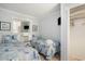 Charming bedroom featuring two twin beds, light blue walls, and decorative nautical accents throughout the space at 5905 South Kings Hwy. # A518, Myrtle Beach, SC 29575