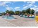 Bright and inviting community pool with umbrellas and various water features at 5905 South Kings Hwy. # A518, Myrtle Beach, SC 29575