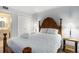 Main bedroom featuring wooden furniture, white bedding, and neutral walls at 5905 South Kings Hwy. # A518, Myrtle Beach, SC 29575