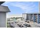 Scenic ocean view from a coastal building, showcasing the beach, water, parking and nearby amenities at 5905 South Kings Hwy. # A518, Myrtle Beach, SC 29575