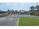 The Ocean Lakes Community entrance has a large sign, palm trees, and well maintained grounds at 6001 S Kings Hwy., Myrtle Beach, SC 29575