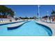 Inviting lazy river with a winding waterway and multiple lounge chairs along the perimeter. Ready for relaxation at 6001 S Kings Hwy., Myrtle Beach, SC 29575