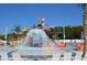 Gathering splash pad with small slides, buckets, and a water-themed decorative pirate ship at 6001 S Kings Hwy., Myrtle Beach, SC 29575