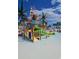 Fun splash zone area with multiple slides and water features, perfect for Gathering entertainment on a sunny day at 6001 S Kings Hwy., Myrtle Beach, SC 29575