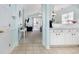 Open-concept floor plan with tiled entryway leading into a living space with vaulted ceilings at 6015 Catalina Dr. # 134, North Myrtle Beach, SC 29582